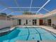 Enjoy a refreshing swim in the pool or unwind in the connected hot tub at 12902 Grand Traverse Dr, Dade City, FL 33525