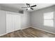 Cozy bedroom with wood flooring and large closet at 12925 Tar Flower Dr, Tampa, FL 33626