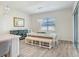 Well-lit dining room with a modern table and decorative accents at 14184 Samoa Hill Ct, Riverview, FL 33569