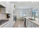 Well-equipped kitchen featuring modern appliances, ample counter space, and an island at 14184 Samoa Hill Ct, Riverview, FL 33569