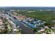 Scenic aerial view showcases waterfront townhomes with canal access and proximity to a golf course and nature preserve at 1625 Watermark Ne Cir, St Petersburg, FL 33702