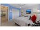 This secondary bedroom has a closet, desk, and views of the outside at 1625 Watermark Ne Cir, St Petersburg, FL 33702