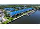 Waterfront townhomes featuring private boat docks and beautiful landscaping for a serene coastal lifestyle at 1625 Watermark Ne Cir, St Petersburg, FL 33702