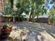 Private backyard, perfect for gardening and relaxing, surrounded by mature trees and greenery at 1813 Landside Dr, Valrico, FL 33594