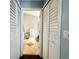 En-suite bathroom with closet and tiled floors at 1813 Landside Dr, Valrico, FL 33594