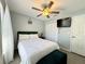 Clean and modern bedroom with closet, television, and a cozy rug at 1813 Landside Dr, Valrico, FL 33594