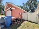 Exterior showing the garage and side access gate of the home at 1813 Landside Dr, Valrico, FL 33594