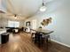 Open concept living room and dining area featuring stylish furniture and decor at 1813 Landside Dr, Valrico, FL 33594