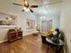 Cozy living room with wood floors, bright windows, and comfortable seating arrangement at 1813 Landside Dr, Valrico, FL 33594