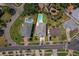 Aerial view of property with a private pool, lush landscaping, and well-maintained yard at 1842 Bayou Grande Ne Blvd, St Petersburg, FL 33703