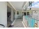 Spacious balcony with a ceiling fan and views of the surrounding neighborhood at 1842 Bayou Grande Ne Blvd, St Petersburg, FL 33703