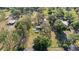 Sprawling lot with mature trees, pool, and multiple structures offering space and privacy at 18838 Huckavalle Rd, Odessa, FL 33556