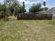 Large backyard featuring chainlink and wood fences for privacy at 1905 Meridel Ave, Tampa, FL 33612