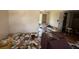 Living room showing walls, flooring and some discarded furniture and other items at 1905 Meridel Ave, Tampa, FL 33612