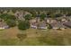 Aerial view features back screened lanai with beautiful lawn looking out to golf course in a serene community at 2007 Acadia Greens Dr # 0, Sun City Center, FL 33573