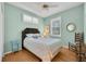 Charming bedroom featuring cool-toned walls and natural light, creating a relaxing atmosphere at 2007 Acadia Greens Dr # 0, Sun City Center, FL 33573