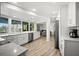 Renovated kitchen featuring shaker cabinets, quartz countertops, and stainless steel appliances at 2142 Ibis, Clearwater, FL 33764
