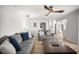 Inviting living room with hardwood floors, comfortable seating, and a decorative coffee table at 2142 Ibis, Clearwater, FL 33764