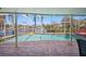 Screened-in pool overlooking a serene waterfront at 2142 Ibis, Clearwater, FL 33764