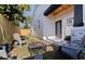 Relaxing backyard featuring a fire pit, chairs, and a charming wooden fence for added privacy at 2150 43Rd N Ter, St Petersburg, FL 33714
