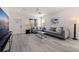 Inviting living room featuring a comfortable sectional sofa, stylish decor, and ample natural light at 2150 43Rd N Ter, St Petersburg, FL 33714