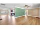 Open living room with hardwood floors, neutral paint, and great lighting at 3065 Merrill Ave, Clearwater, FL 33759