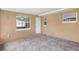 Enclosed patio featuring a decorative tiled floor and access to the outside at 3065 Merrill Ave, Clearwater, FL 33759