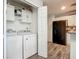 Convenient laundry room with modern appliances located near the kitchen at 3212 55Th E St, Palmetto, FL 34221