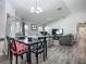 Spacious living room and dining area featuring modern flooring and an open layout at 3212 55Th E St, Palmetto, FL 34221