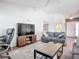 Bright living room with a ceiling fan, hardwood floors, and comfortable seating at 3212 55Th E St, Palmetto, FL 34221