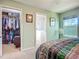 Spacious main bedroom featuring a walk-in closet and ensuite bathroom at 3212 55Th E St, Palmetto, FL 34221