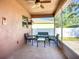 Screened porch featuring outdoor seating and a view of the backyard at 3212 55Th E St, Palmetto, FL 34221