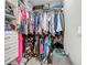 Well-organized walk-in closet with shelving, hanging rods, and compartments for clothes, shoes, and accessories at 3212 55Th E St, Palmetto, FL 34221