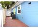 Backyard with a brick patio, exterior home view, and an air conditioning unit at 3306 E Chelsea St, Tampa, FL 33610