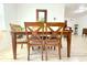 Traditional dining room with table for six and tile floors at 3306 E Chelsea St, Tampa, FL 33610