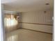 A dining room displays neutral tones and bright natural light at 35209 Dolphin Lake Dr, Zephyrhills, FL 33541