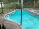 A refreshing screened-in pool provides a relaxing outdoor living space at 35209 Dolphin Lake Dr, Zephyrhills, FL 33541