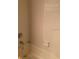 Shower is clean and functional, featuring white tile and essential fixtures, ready for use at 35209 Dolphin Lake Dr, Zephyrhills, FL 33541