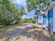 Expansive backyard featuring a wooden deck and patio area perfect for outdoor entertaining at 3706 N Ola Ave, Tampa, FL 33603