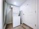 Convenient laundry area featuring a stacked washer and dryer unit at 3706 N Ola Ave, Tampa, FL 33603