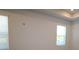 Bedroom with neutral color palette, with bright light from large windows at 404 N Westland St # 1, Tampa, FL 33609