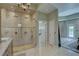 Bathroom featuring a seamless glass shower and a door leading to the bedroom at 413 8Th N Ave, Tierra Verde, FL 33715