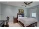 Relaxing bedroom with a comfortable bed, elegant decor, and a ceiling fan at 413 8Th N Ave, Tierra Verde, FL 33715