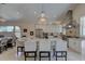 Gourmet kitchen boasts an island with seating and a stainless steel hood above the stove at 413 8Th N Ave, Tierra Verde, FL 33715