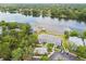 Scenic waterfront townhomes with beautiful lake views, docks, and surrounding mature trees at 4141 Dolphin Dr # 4141, Tampa, FL 33617