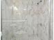 The bathroom features a tiled standing shower with glass door at 4141 Dolphin Dr # 4141, Tampa, FL 33617