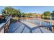 Private deck overlooking the lake, perfect for relaxing and enjoying waterfront scenery at 4141 Dolphin Dr # 4141, Tampa, FL 33617