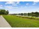Enjoy picturesque lake views, a gazebo, and lush grassy areas for outdoor recreation and relaxation at 4141 Dolphin Dr # 4141, Tampa, FL 33617