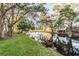 Picturesque pond reflecting the surrounding lush greenery and serene atmosphere at 4141 Dolphin Dr # 4141, Tampa, FL 33617