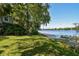 Tranquil waterfront property with lush greenery and a beautiful view of the lake at 4141 Dolphin Dr # 4141, Tampa, FL 33617
